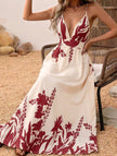 Red floral print backless cami maxi dress by FJØRNA, flowing fabric with a deep back and elegant floral pattern.