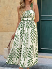 FJØRNA leaf print white cami waist maxi dress with green foliage pattern, flowy fabric, and sleeveless design for elegant summer wear