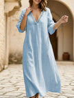 White linen V-neck loose maxi dress by FJØRNA, flowing and lightweight with a relaxed fit, perfect for casual or summer wear.