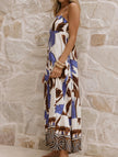 Multicolor tropical print cami maxi dress by FJØRNA featuring lightweight fabric and flowing silhouette, perfect for summer wear.