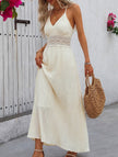 White FJØRNA halter lace patch V neck maxi dress with flowing silhouette and intricate lace details, perfect for elegant occasions.