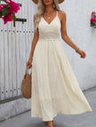 White FJØRNA halter lace patch V-neck maxi dress, featuring flowy fabric and elegant design, perfect for summer occasions.
