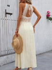 FJØRNA white halter lace patch V neck maxi dress with flowing fabric, perfect for elegant summer occasions.