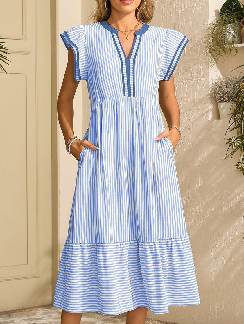FJØRNA colorblock stripe flutter sleeve dress in white with blue accents, featuring a stylish and casual design.