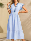 FJØRNA colorblock stripe flutter sleeve white dress with blue accents, featuring a stylish and comfortable women’s dress design.
