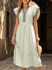 FJØRNA colorblock stripe Flutter Sleeve Dress in white with green accents, featuring a stylish, flowy design and V-neckline.