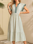 FJØRNA colorblock stripe flutter sleeve white dress with green accents, featuring a stylish and comfortable design.