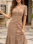 White doll collar short sleeve dress by FJØRNA, featuring a classic design and soft fabric, perfect for casual or special occasions.