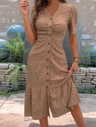 White doll collar short sleeve dress by FJØRNA, stylish and cute dress for children, shown in the image.