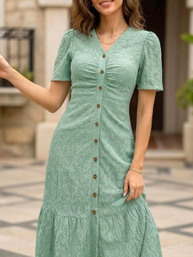 FJØRNA doll collar short sleeve white dress with a fitted bodice and flared skirt, perfect for casual or special occasions.