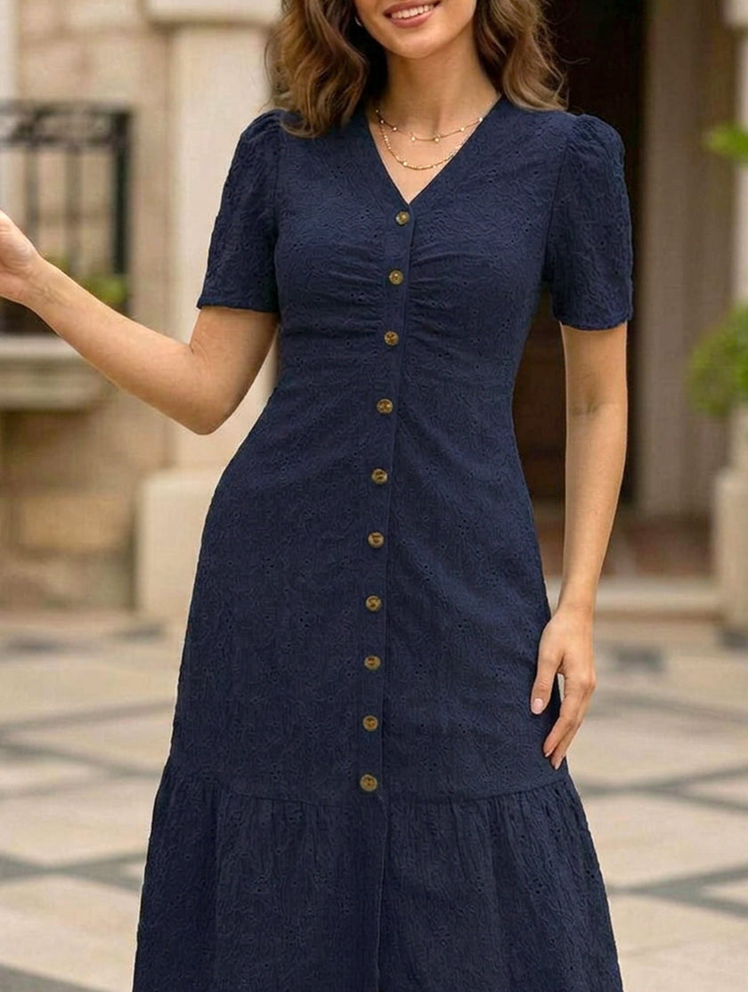 White doll collar short sleeve dress by FJØRNA, featuring a classic design with a fitted bodice and flared skirt.
