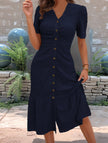 White doll collar short sleeve dress by FJØRNA, featuring a classic design and clean fabric, perfect for casual or formal wear.