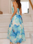 Blue floral print flowy cami maxi dress by FJØRNA, featuring a lightweight, elegant design with a flowing silhouette.
