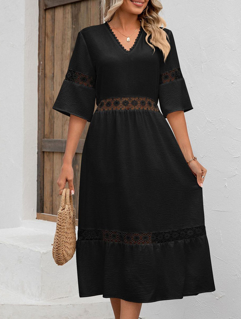 FJØRNA white v-neck hollow short sleeve dress, casual elegant design, sleeveless with a fitted waist and flowing skirt.