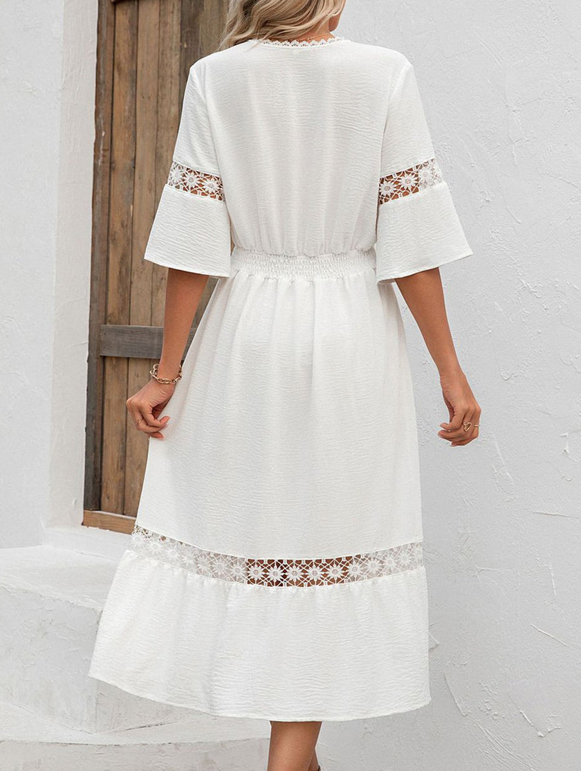 White V neck hollow short sleeve dress by FJØRNA, showcasing a stylish, lightweight dress with a relaxed fit and elegant design.