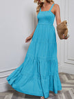 Blue retro striped maxi dress by FJØRNA featuring a flowing silhouette and classic pattern, perfect for casual or summer wear.