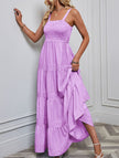 Purple retro striped maxi dress by FJØRNA featuring a flowing design and bold horizontal stripes for a stylish, vintage-inspired look.