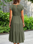 FJØRNA solid white cross-border sleeved dress, stylish and elegant, displayed on a hanger against a neutral background.