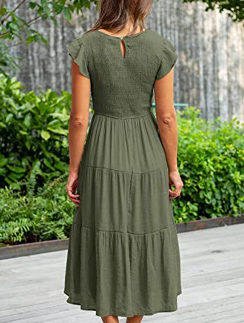 FJØRNA solid white cross-border sleeved dress, stylish and elegant, displayed on a hanger against a neutral background.