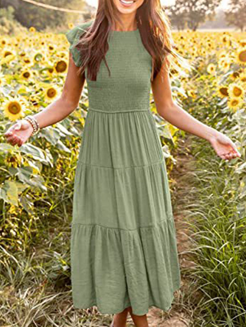 FJØRNA solid white cross-border sleeved dress, stylish and elegant, featuring a flowing design and long sleeves.