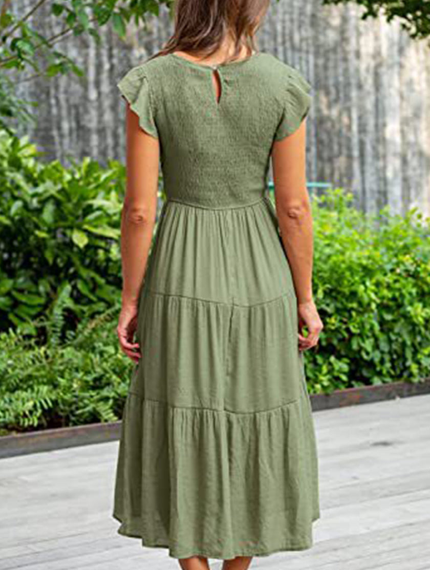FJØRNA solid white cross-border sleeved dress with a relaxed fit, displayed on a hanger.