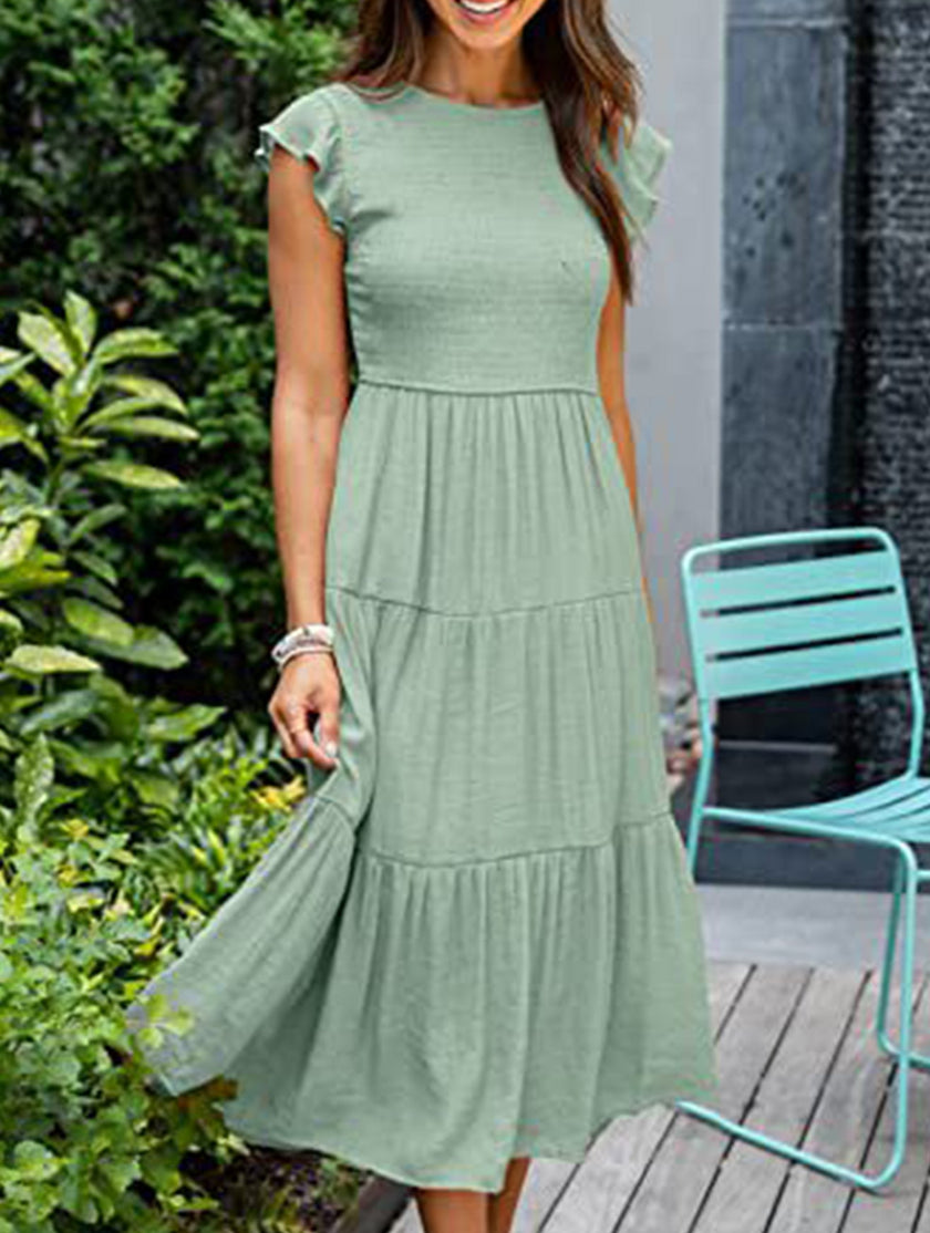 Light green FJØRNA solid color cross-border sleeved dress displayed on a model, showcasing its elegant design and fit.