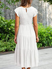 White solid color cross-border sleeved dress by FJØRNA, featuring a stylish and elegant design perfect for various occasions.