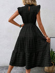 Black FJØRNA ruffled flutter sleeve tie textured dress with a stylish silhouette and intricate fabric details.