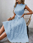 Light blue FJØRNA ruffled flutter sleeve tie textured dress, showcasing a feminine silhouette with delicate ruffle details.