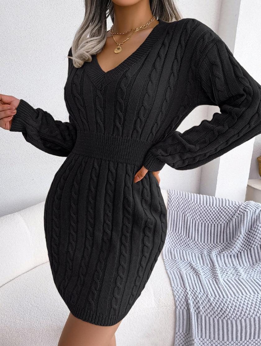 Black FJØRNA cable-knit waist-hugging hip dress, stylish and form-fitting, made from soft knitted fabric, perfect for fashionable wear.