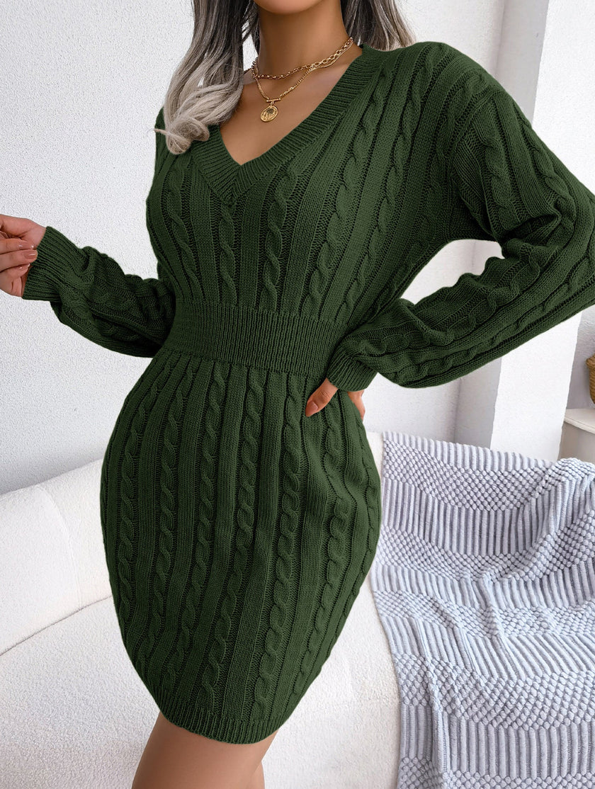 FJØRNA white cable-knit waist-hugging hip dress, stylish and fitted, shown on a model with a close-up view of the knit texture.