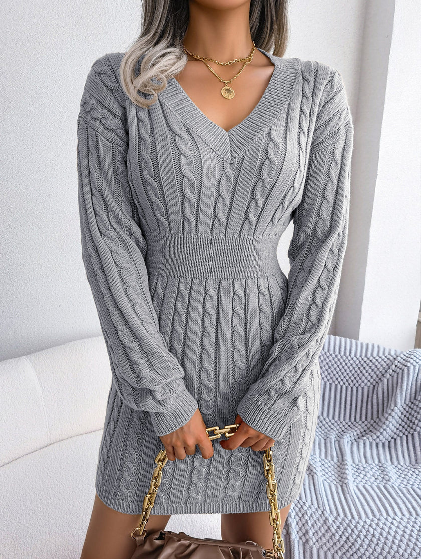 FJØRNA white cable-knit waist-hugging hip dress, stylish and fitted, with a cozy knitted texture, perfect for casual or chic looks.