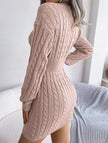 FJØRNA white cable-knit waist-hugging hip dress, stylish and form-fitting, displayed on a model in a fashion photoshoot.