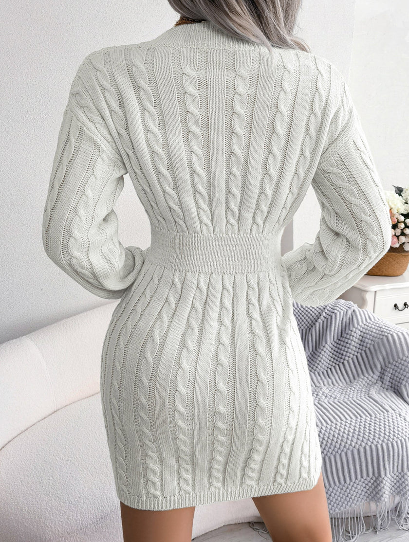 White cable-knit hip dress by FJØRNA featuring a waist-hugging fit and stylish design.