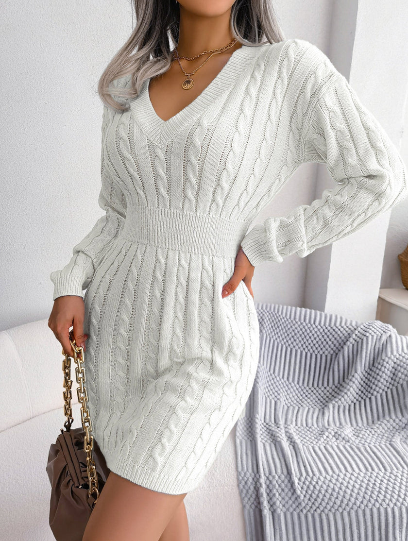 White FJØRNA cable-knit waist-hugging hip dress, stylish and fitted, perfect for casual or semi-formal wear.