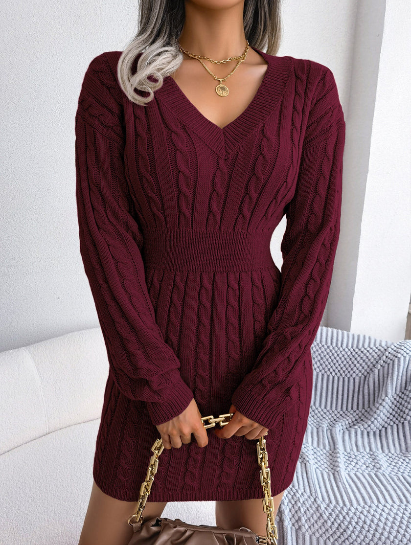 White cable-knit waist-hugging hip dress by FJØRNA, featuring a stylish and cozy knitted design perfect for casual or chic occasions.