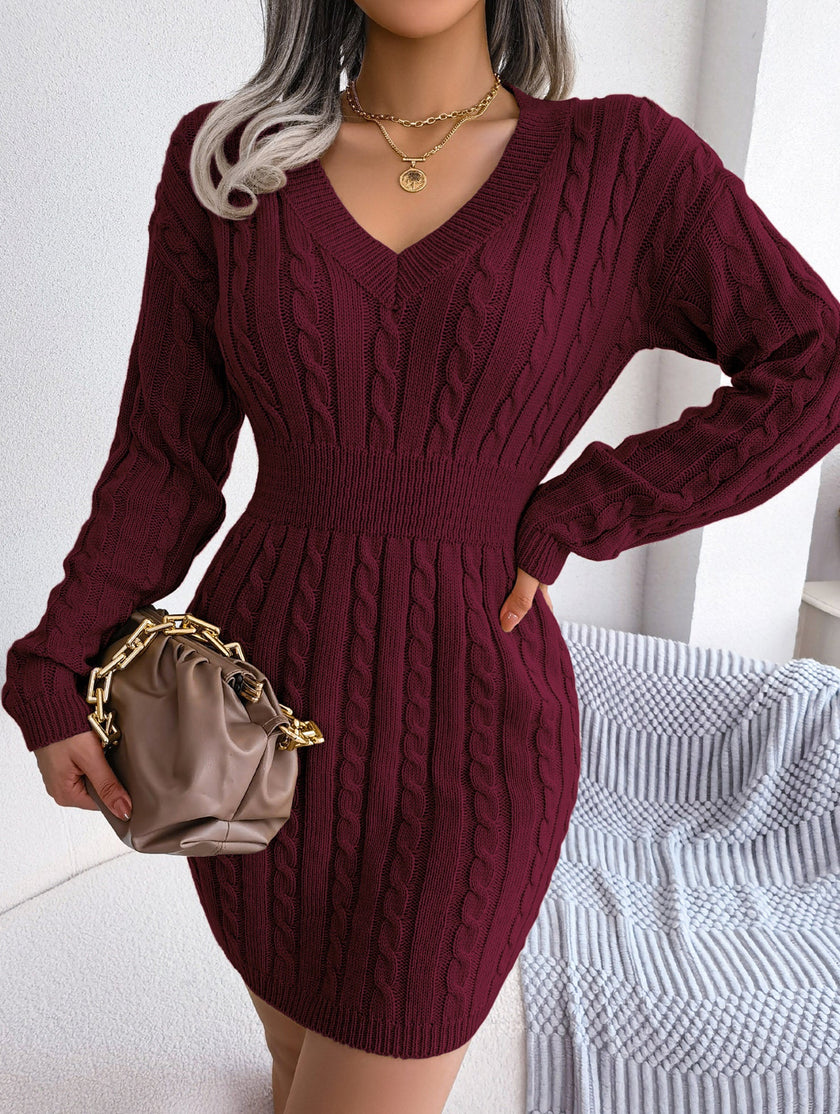 White cable-knit waist-hugging hip dress by FJØRNA, stylish and fitted for a modern look.