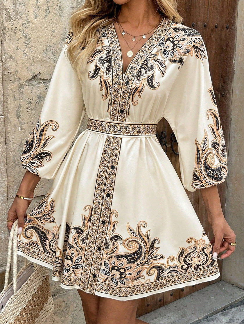 FJØRNA printed white V-neck three-quarter sleeve tie-waist dress, casual and stylish, shown on a model.