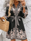 FJØRNA printed V-neck three-quarter sleeve tie-waist dress in white, featuring a stylish design and elegant silhouette.