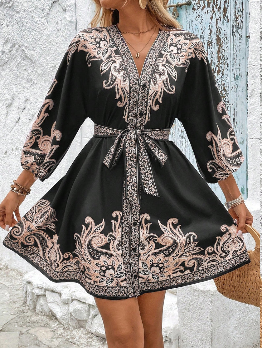 FJØRNA printed V-neck three-quarter sleeve tie-waist dress in white, featuring a stylish design and elegant fit.