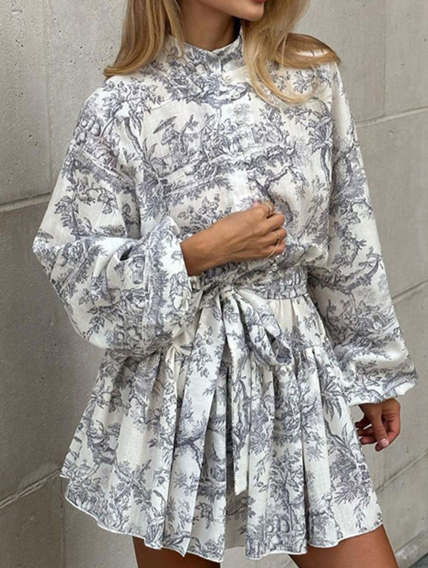 FJØRNA retro lace-up print dress in white, featuring a vintage-inspired design with lace-up front and classic silhouette.