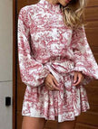 White retro lace-up print dress by FJØRNA, featuring a stylish vintage-inspired design with lace-up front details.