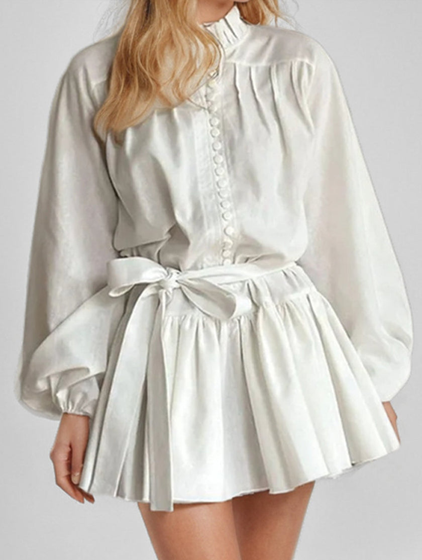 White retro lace-up print dress by FJØRNA, featuring a vintage-inspired design with lace-up details and a classic silhouette.
