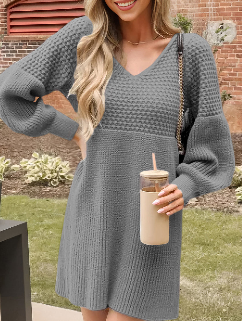 FJØRNA white V-neck puff sleeve knitted sweater dress with solid color, featuring a fitted silhouette and stylish design.