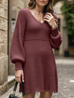 White FJØRNA V-neck puff sleeve knitted sweater dress with solid color and cozy knit texture.