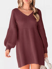 White V-neck puff sleeve knitted sweater dress by FJØRNA, featuring a solid color and stylish design.