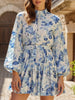 Blue FJØRNA long-sleeved tie-print dress with a stylish design, featuring a comfortable fit and elegant pattern.