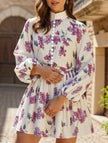 FJØRNA long-sleeved tie-print white dress with a stylish silhouette, perfect for casual or semi-formal occasions.