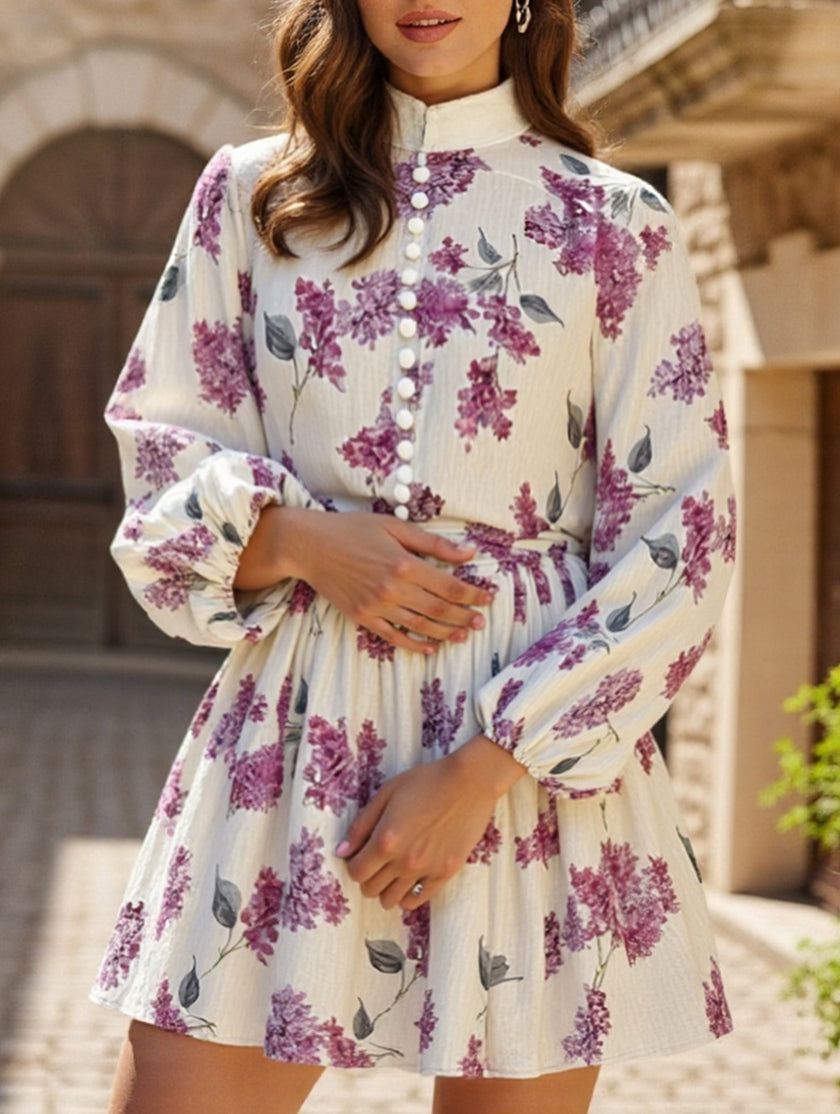 FJØRNA long-sleeved tie-print white dress with a stylish silhouette, perfect for casual or semi-formal occasions.
