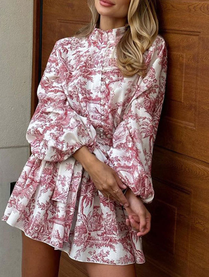 FJØRNA long-sleeved white dress with a stylish tie-print design, perfect for fashion-forward occasions.